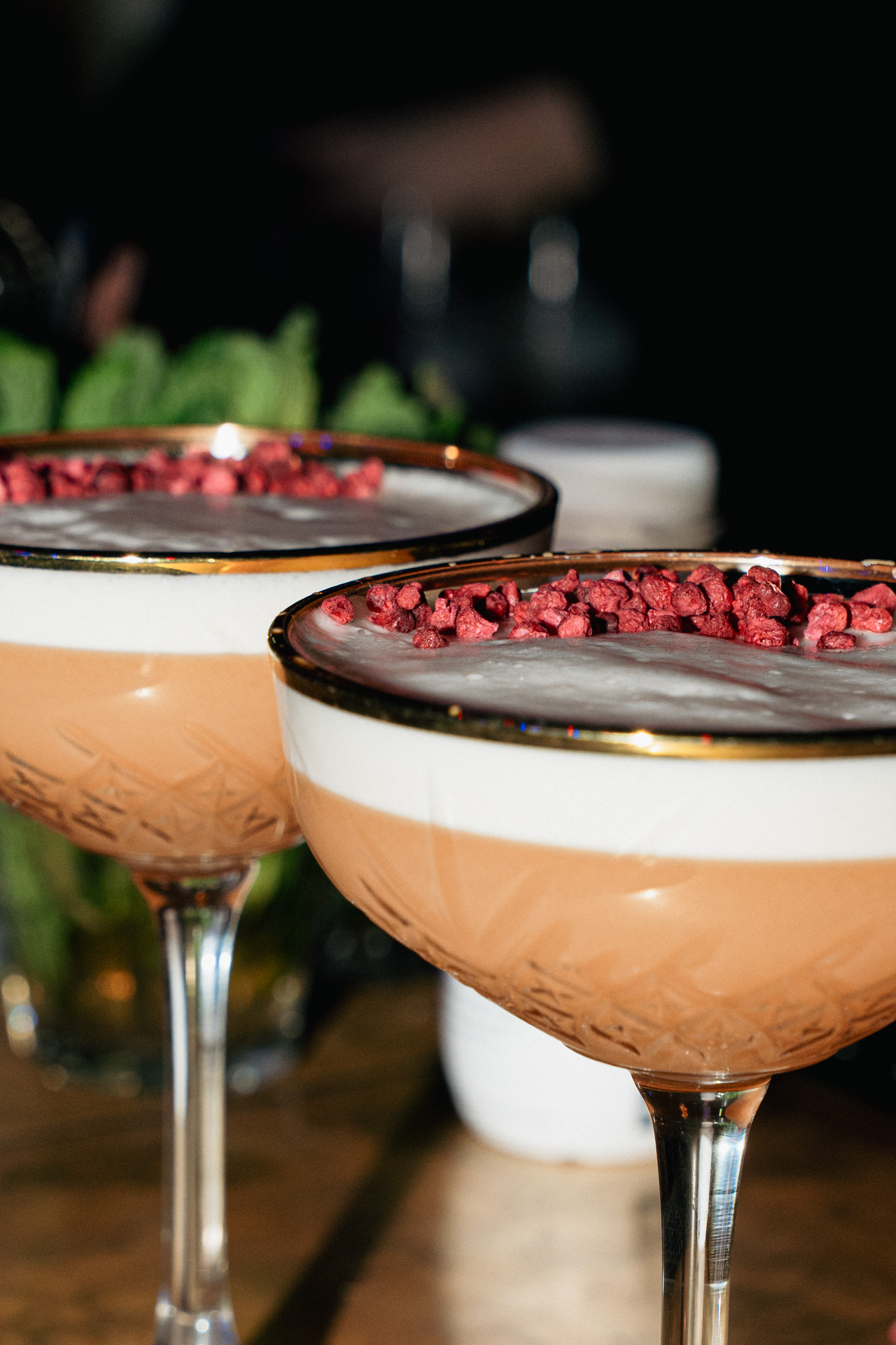 A finished cocktail in soft focus.