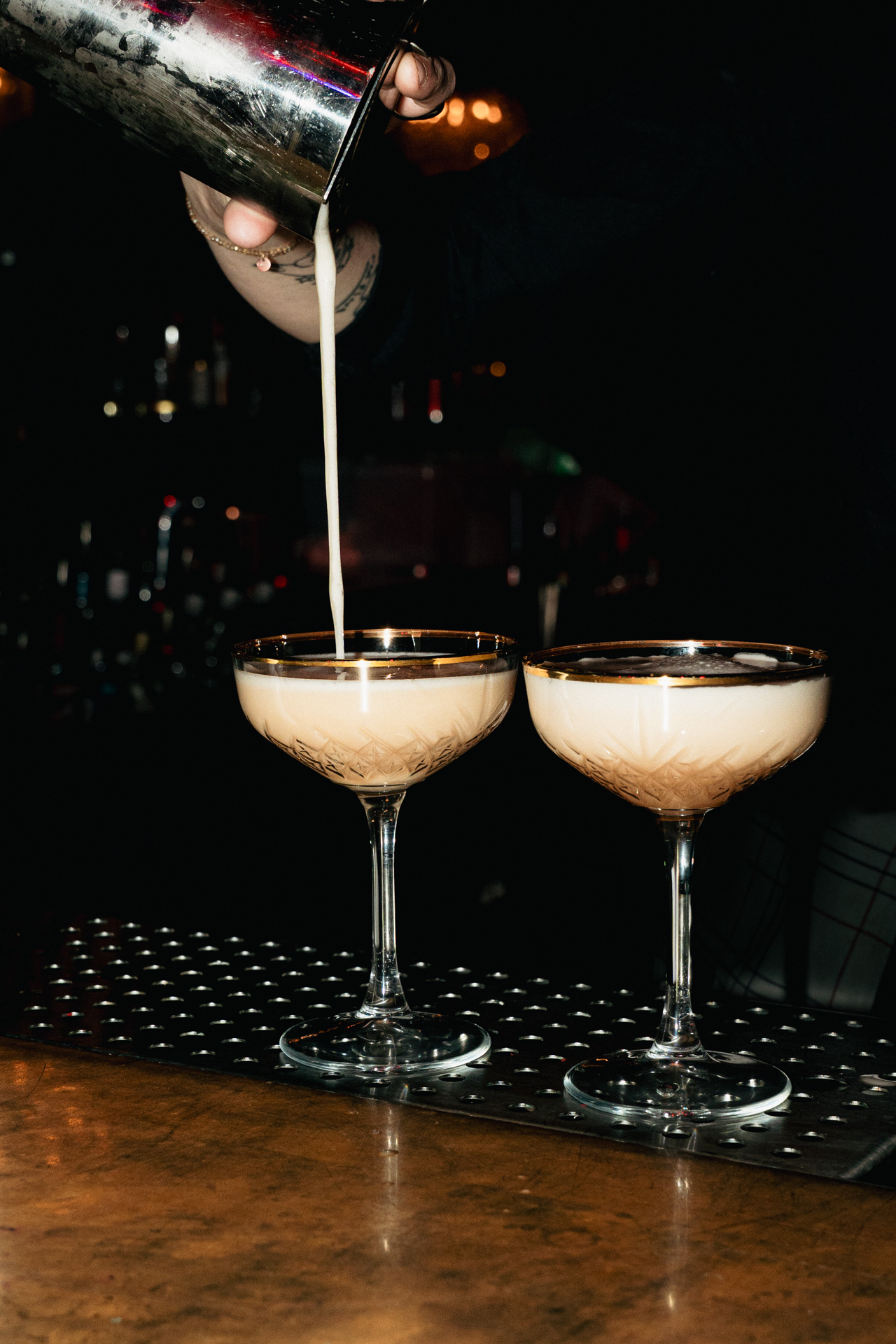 A pair of drinks in warm light.